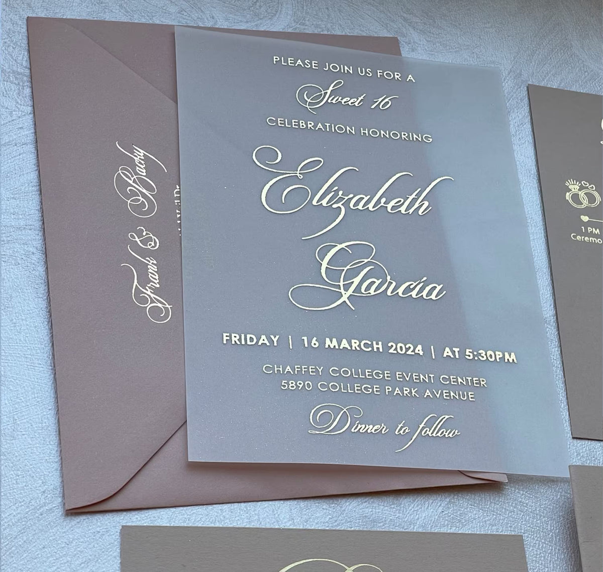 16th birthday invitations on vellum beside wax seals, a personalized sweet 16 invitation set.