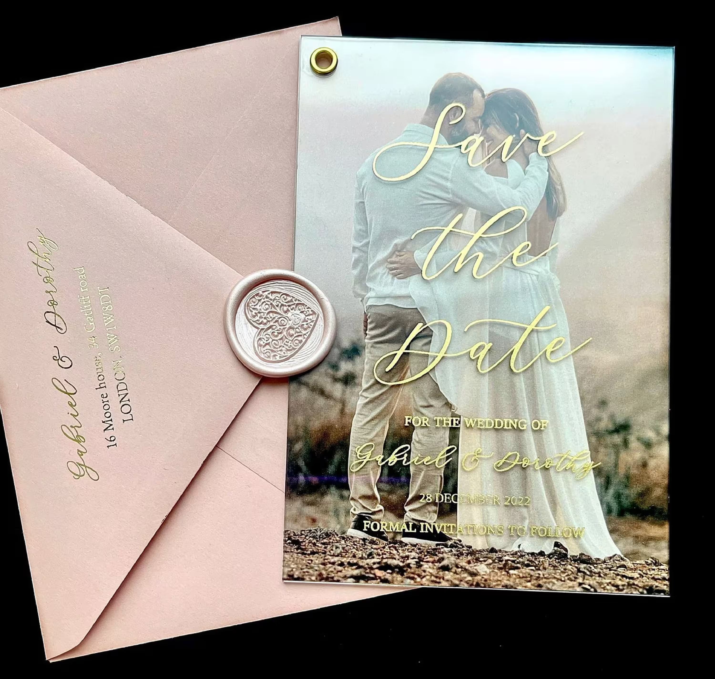 Acrylic Save the Date card featuring a wedding photo with elegant foil lettering