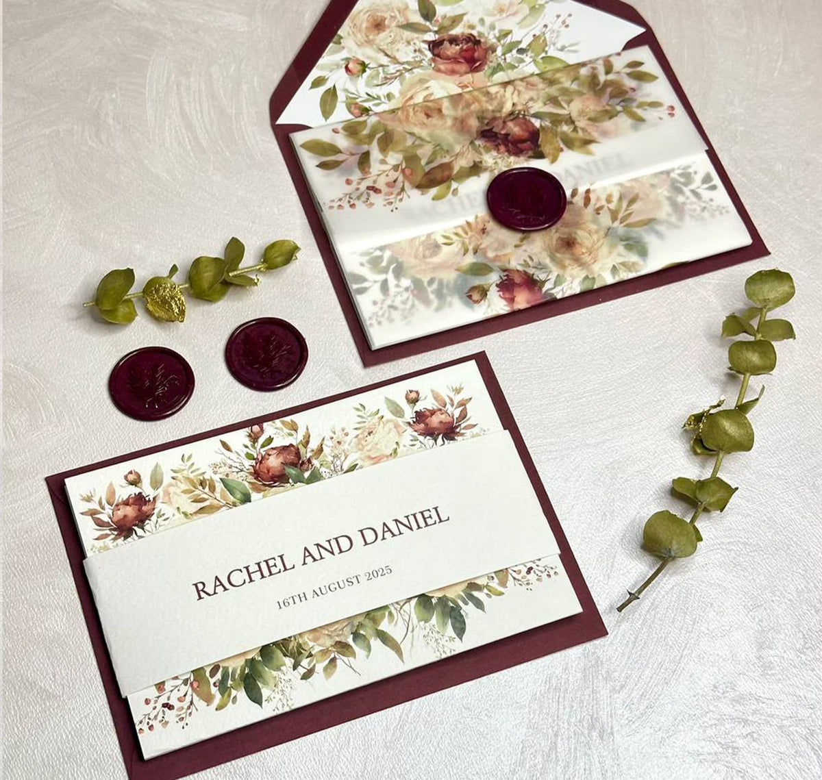 Burgundy floral concertina wedding invitations vellum jacket personalized with names and wedding date