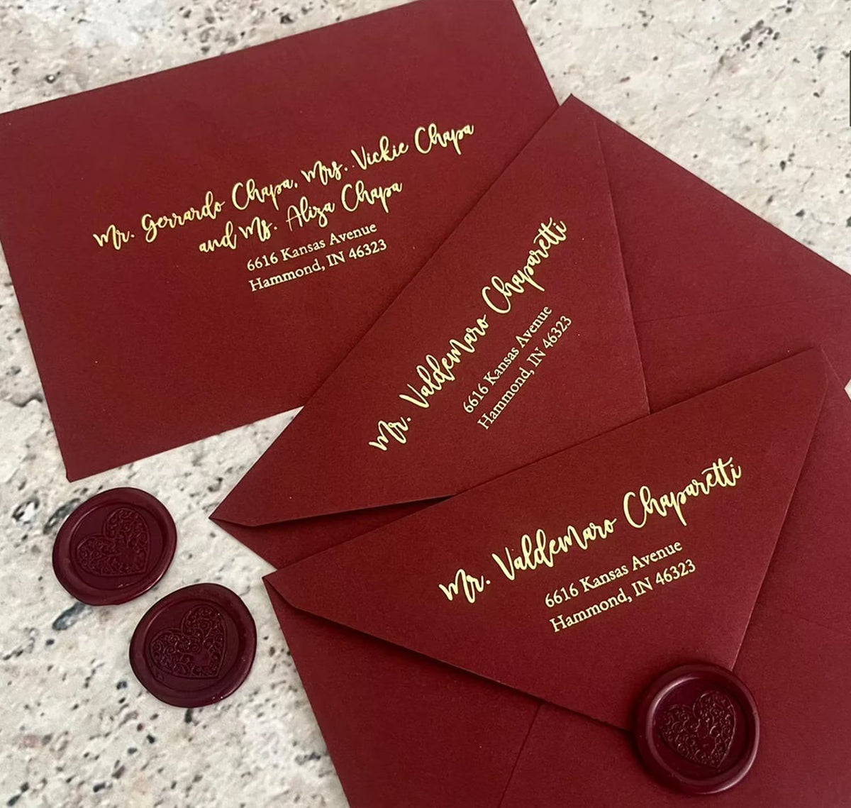 Custom address printing on burgundy wedding envelopes