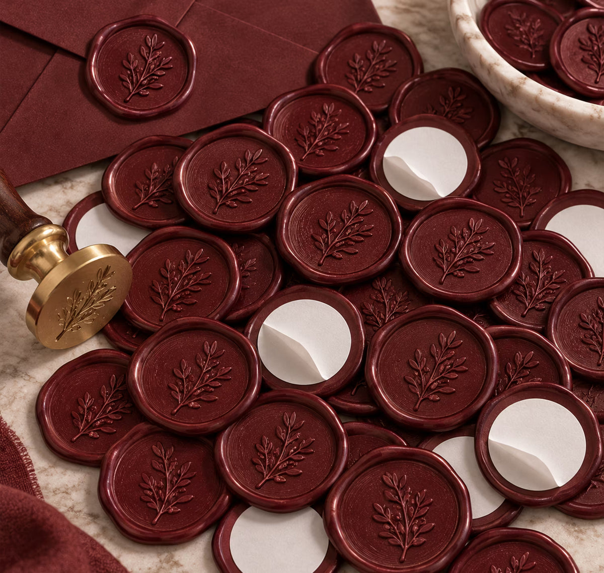 Burgundy wax seals for wedding stationery