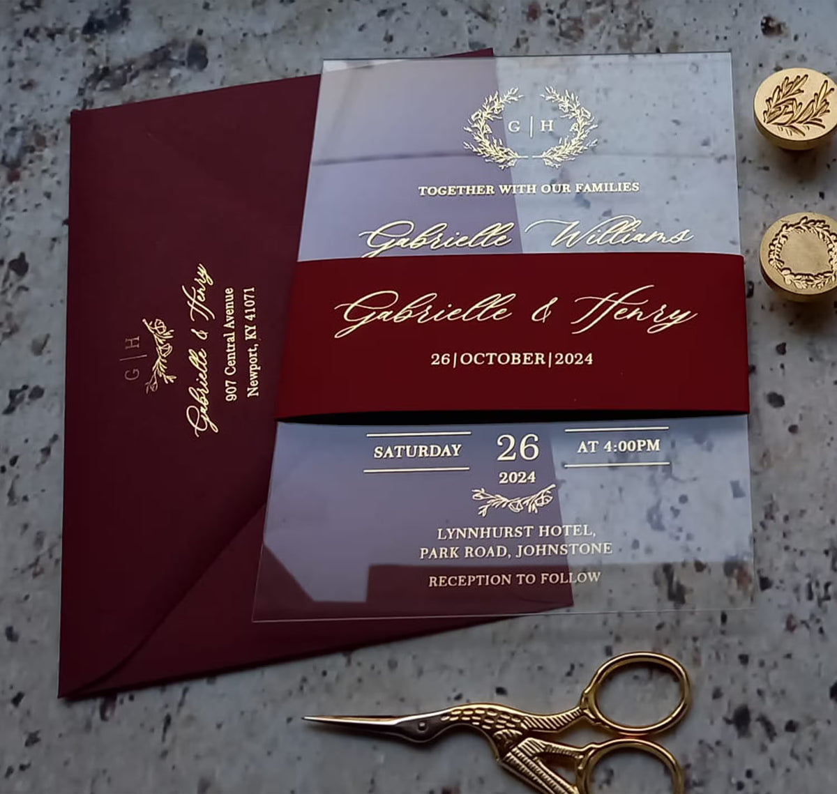 Personalized acrylic wedding invitation with monogram wreath, names and wedding date in foil lettering
