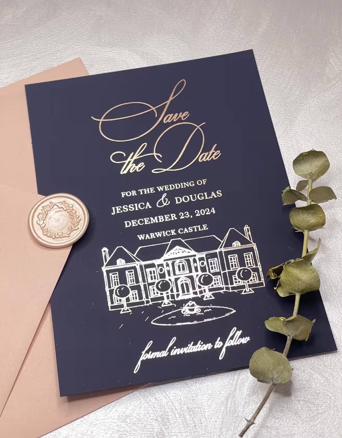 Save the Date venue illustration on a navy blue wedding card with foil details