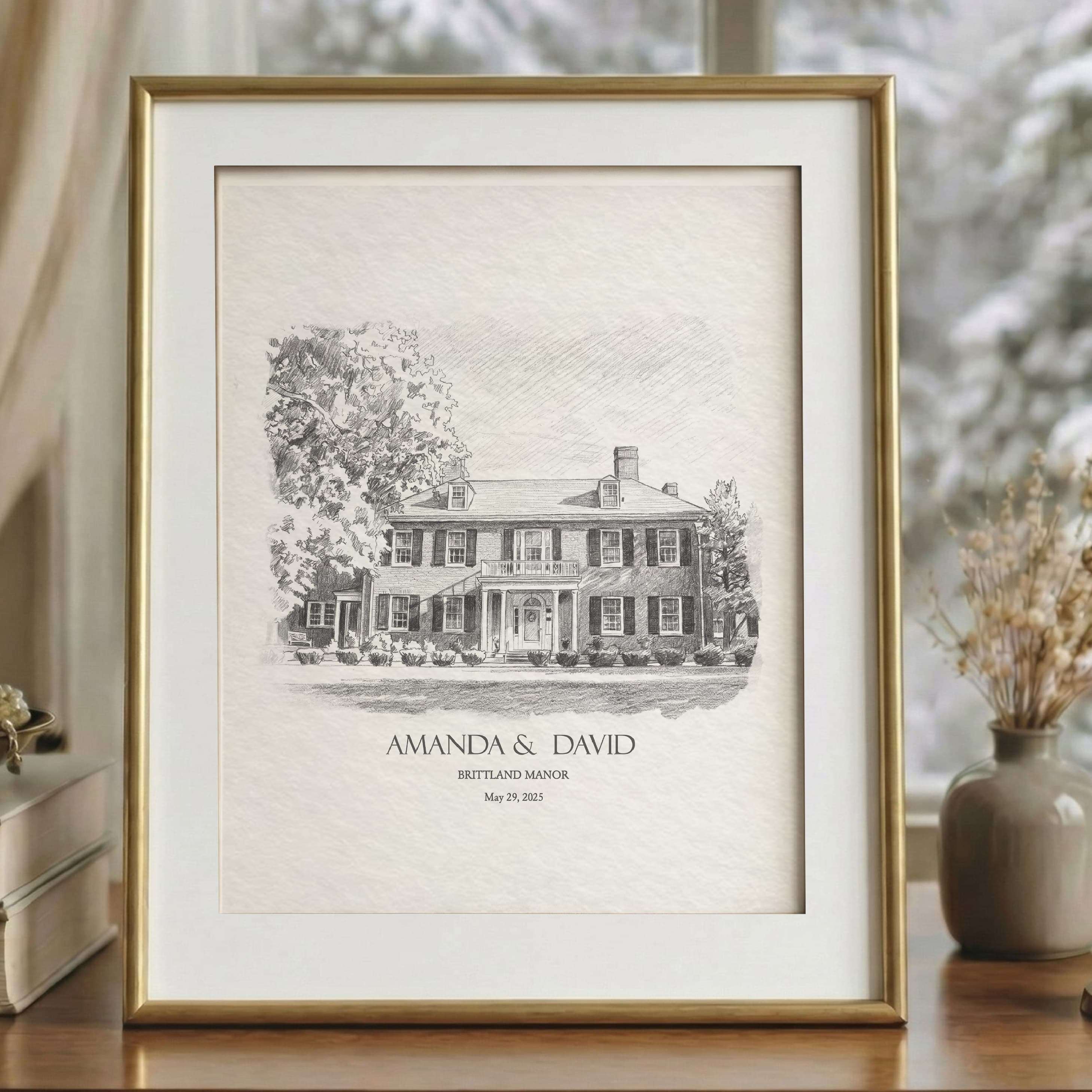 Framed watercolor portrait of Brittland Manor with soft spring blossoms and detailed architectural illustration.
