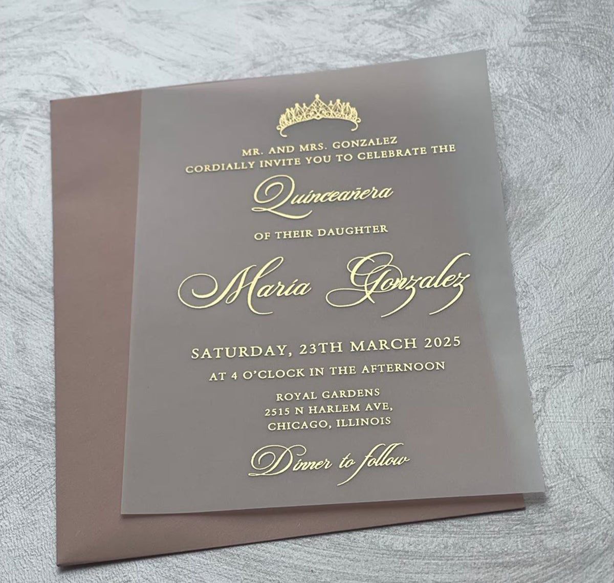 Quince invitations on vellum with foil script and a tiara, a personalized invitation for quince with the ceremony and reception details.