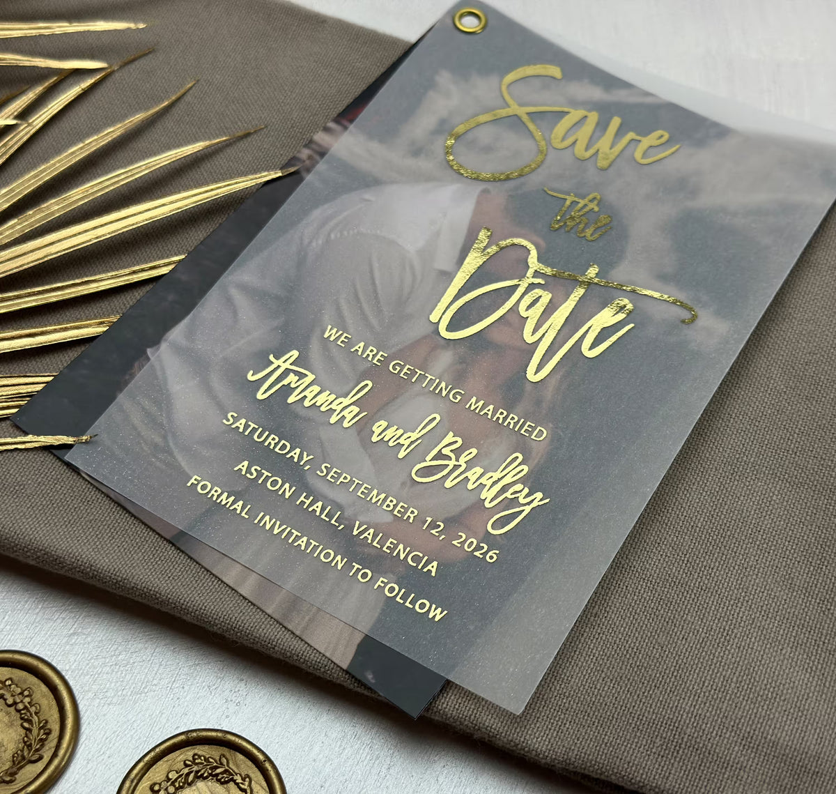 Personalized save the date card with your photo under translucent vellum and foil lettering