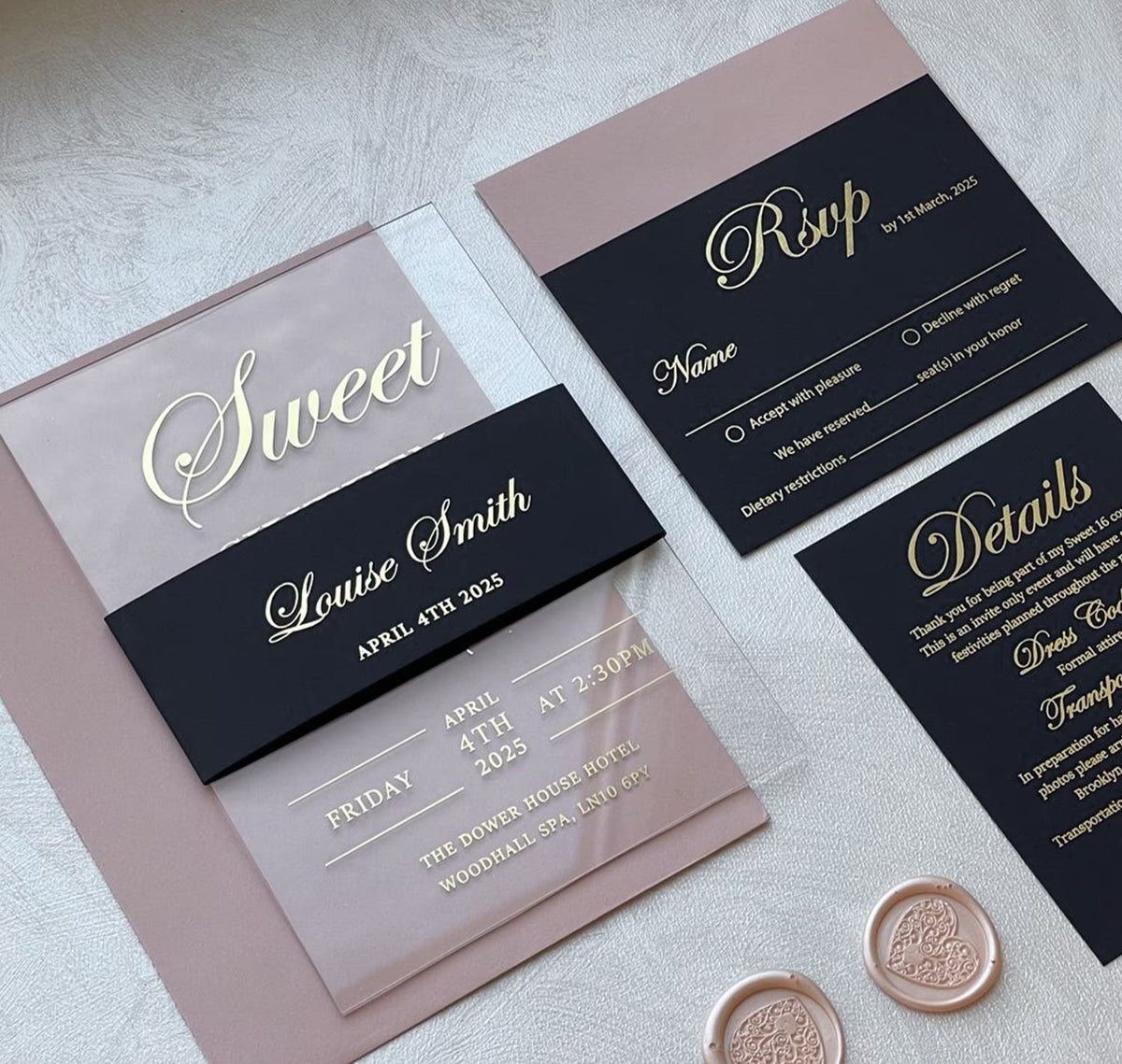 Sweet 16 invitations on clear acrylic with foil lettering and a belly band, personalized with her name, date and venue.
