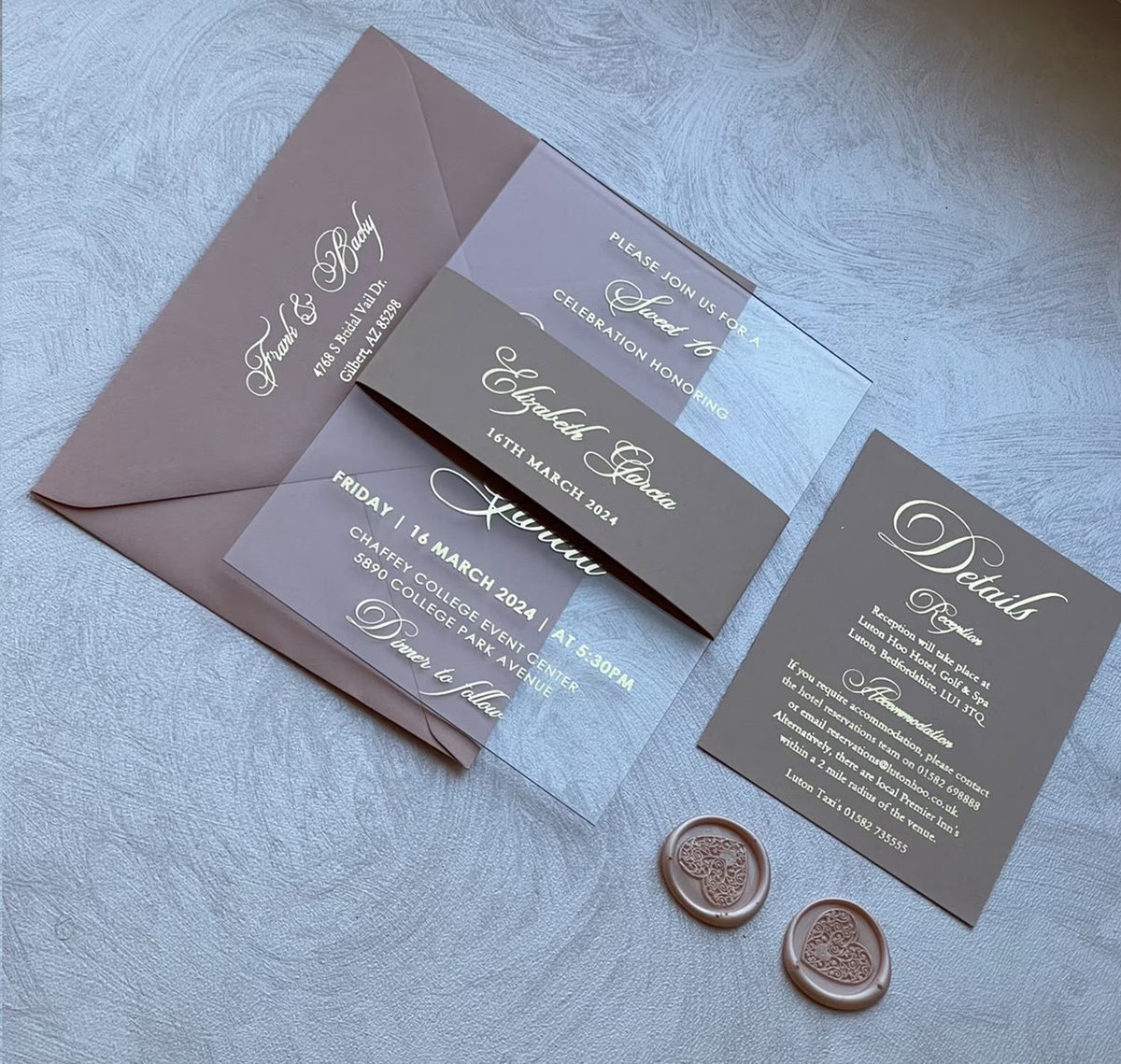 Sweet 16 party invitations on clear acrylic beside wax seals and an envelope with foil lettering, personalized 16th birthday invitations.