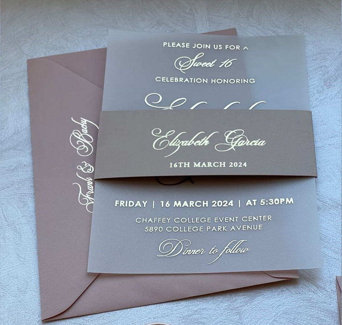 Sweet sixteen invitation on vellum shown with an envelope that has foil lettering for the return address.