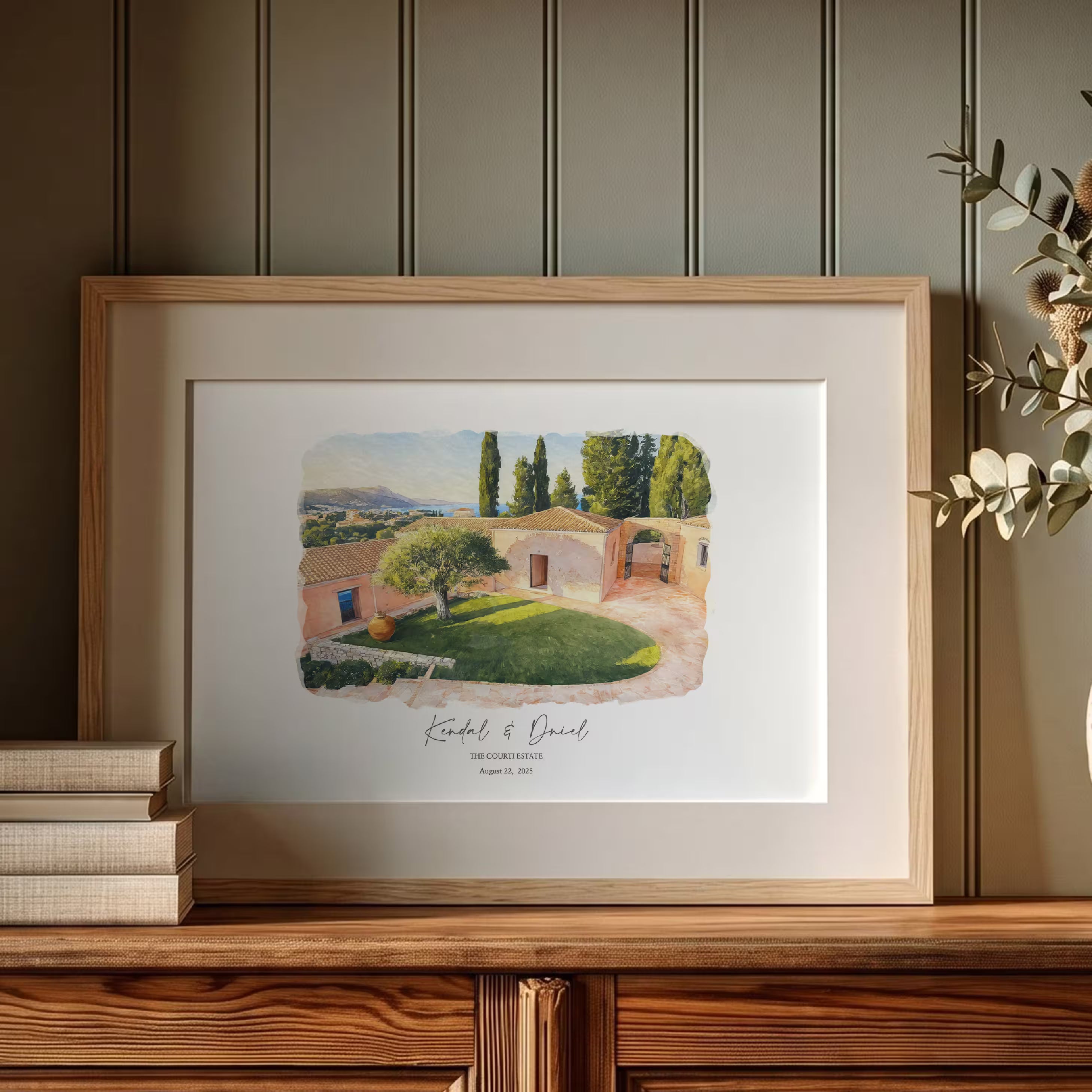 The Courti Estate watercolor portrait framed in light oak with a white mount, displayed on a shelf, a destination wedding gift fine art printed on premium watercolor paper