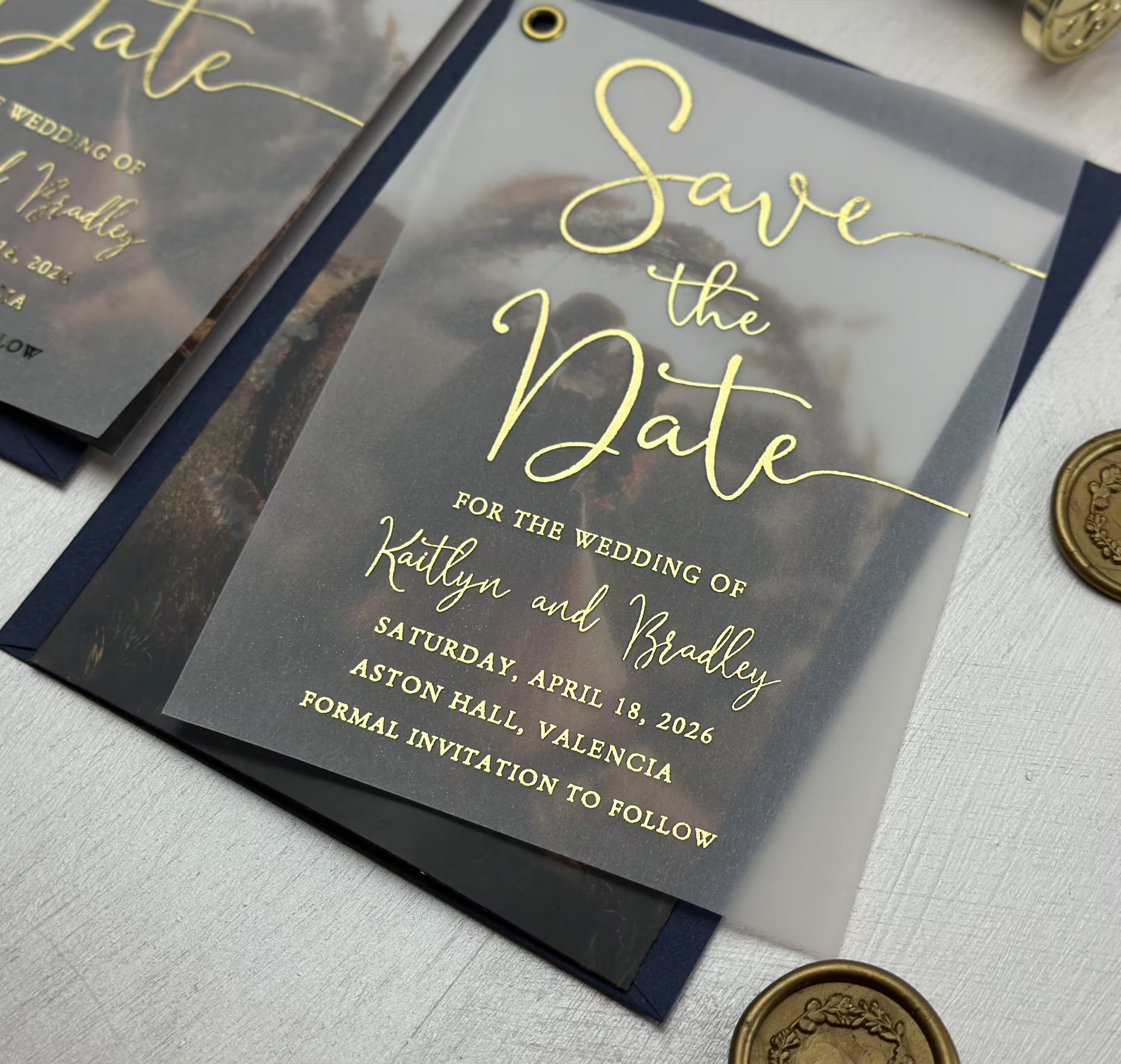 Translucent vellum photo wedding announcement with elegant foil lettering and matching envelope