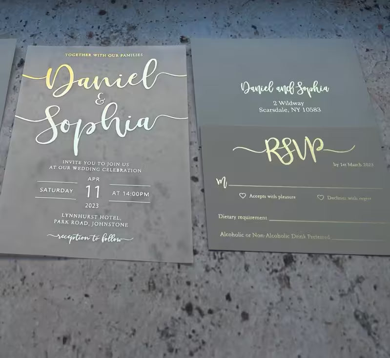 Gold foil vellum wedding invitation with burgundy envelope, wax seal, and matching order of the day, RSVP, and details cards