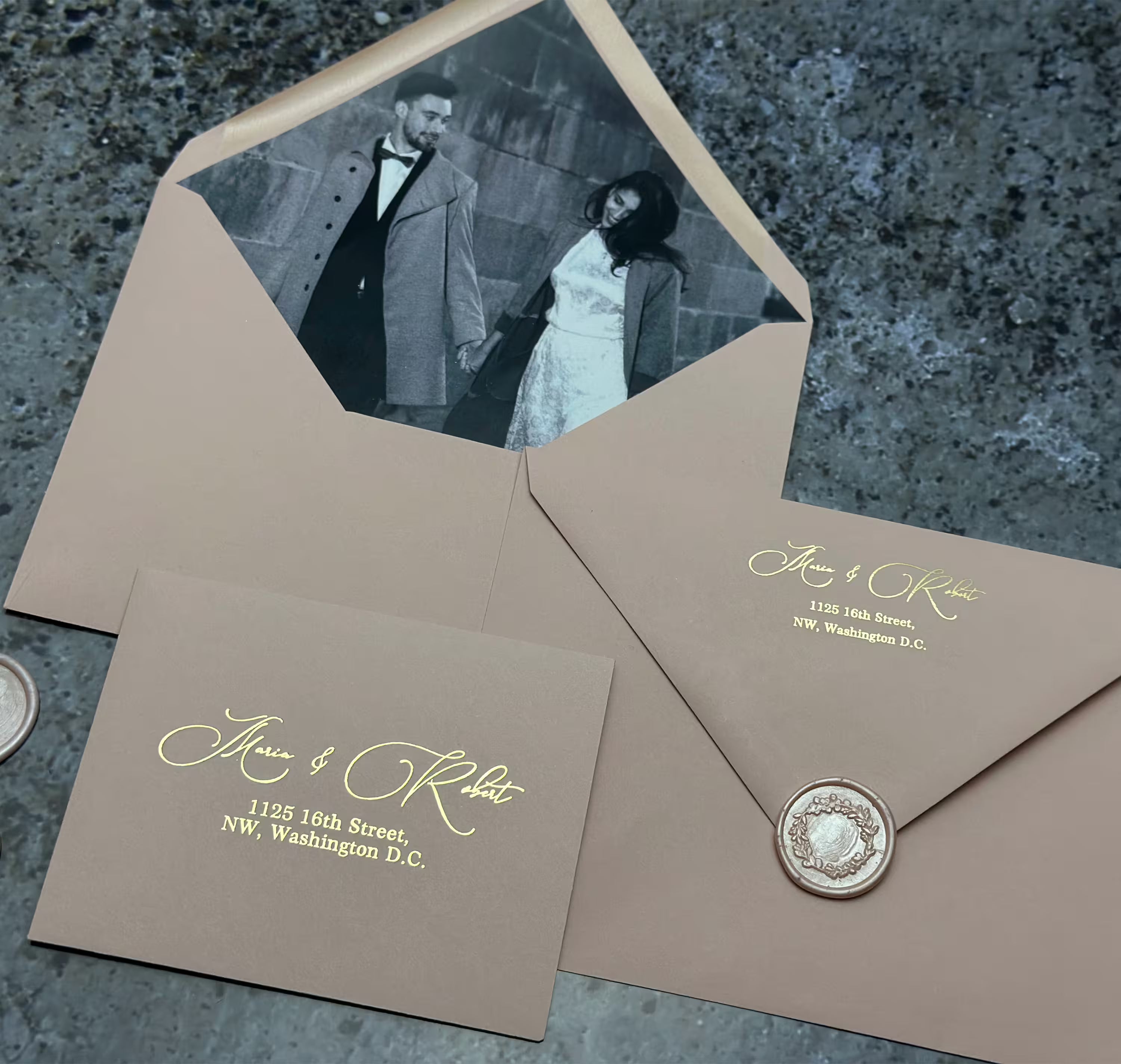 Black and gray vellum wedding invitation suite with custom insert and elegant gold foil typography