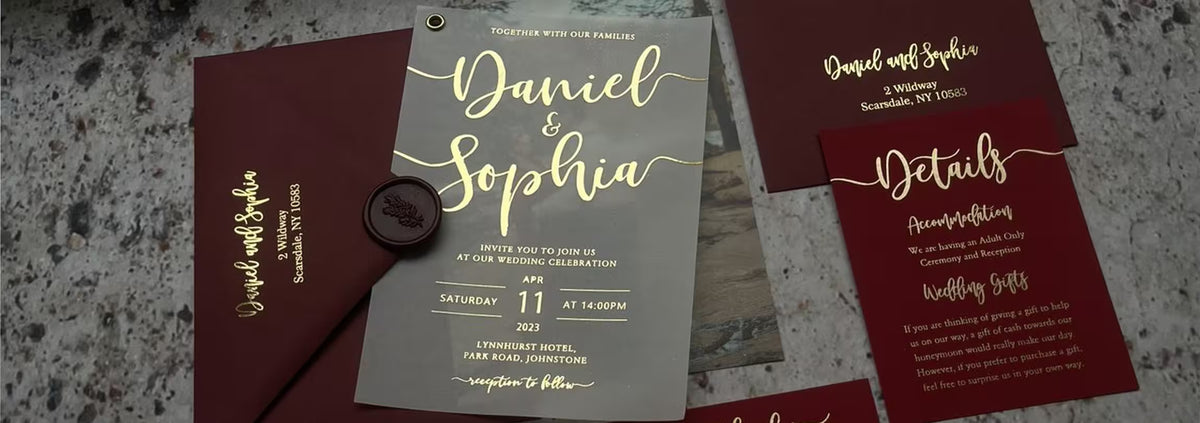 Vellum wedding invitation with elegant calligraphy and floral details
