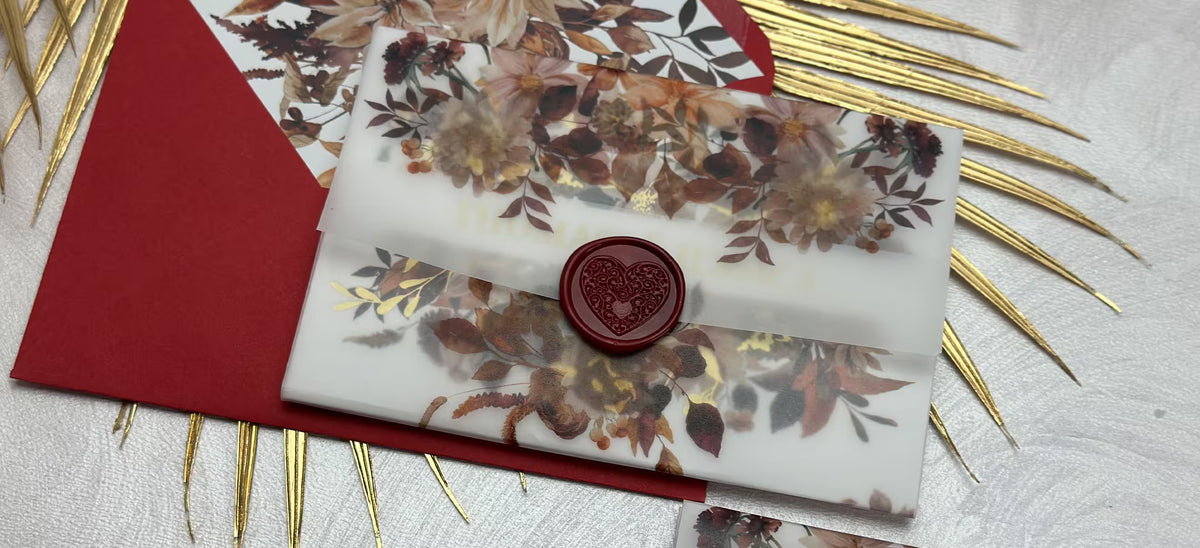 All in one wedding invitations concertina suite with autumn floral design, burgundy wax seal and vellum jacket