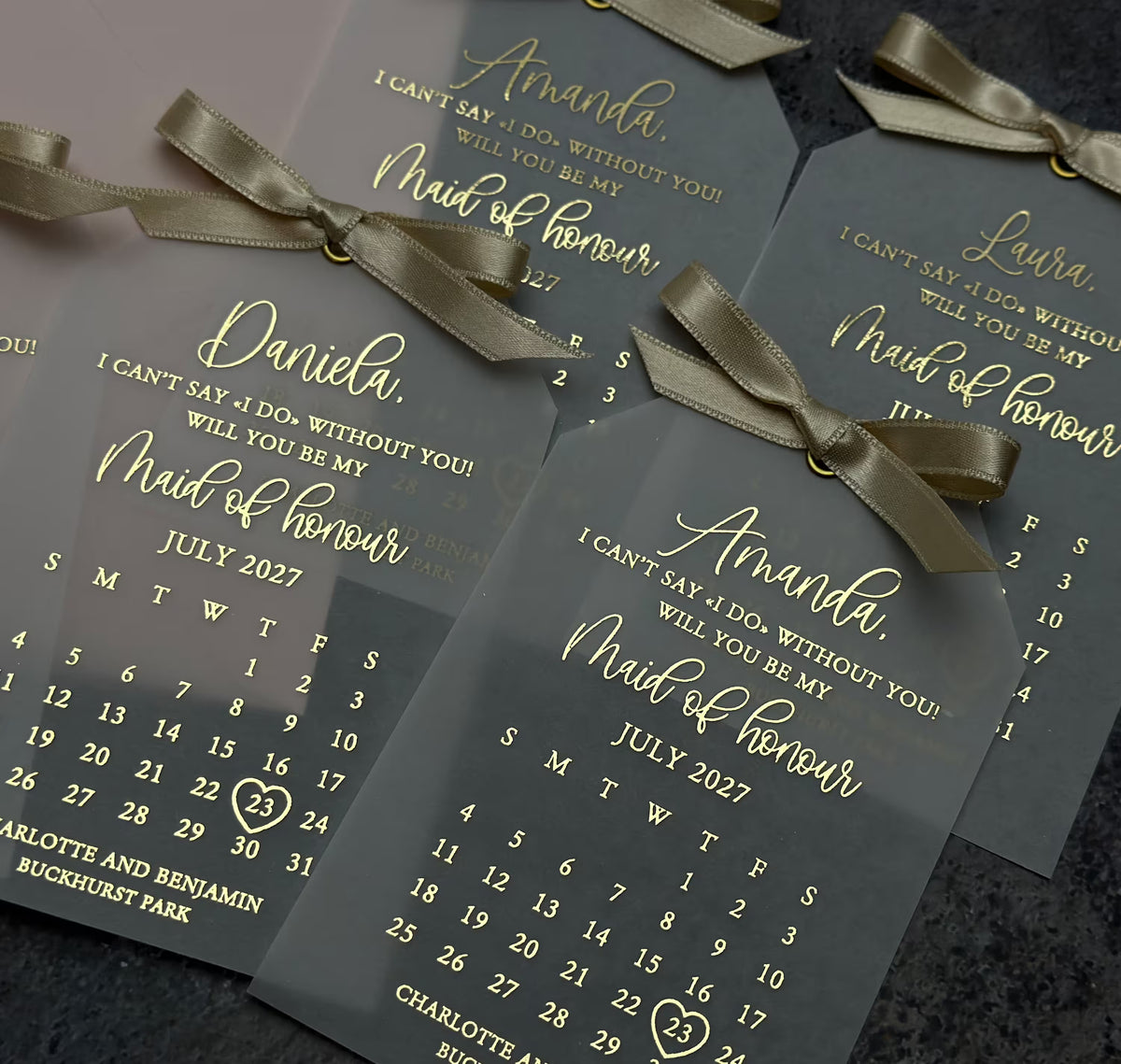Personalized proposal card featuring a custom wedding calendar, foil lettering, and a translucent vellum design.