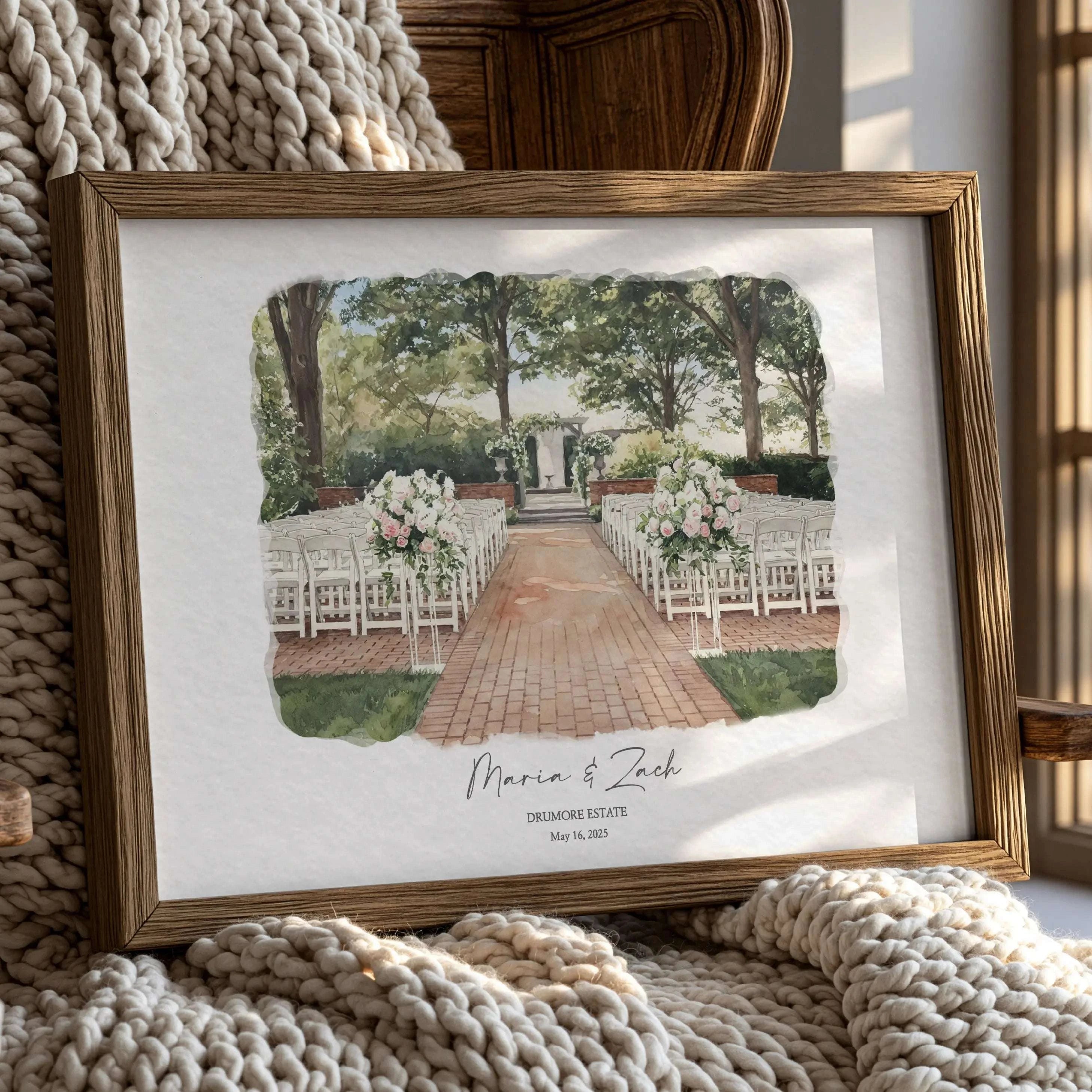 Framed watercolor portrait of Drumore Estate wedding ceremony setup with floral aisle and elegant outdoor garden venue decor.