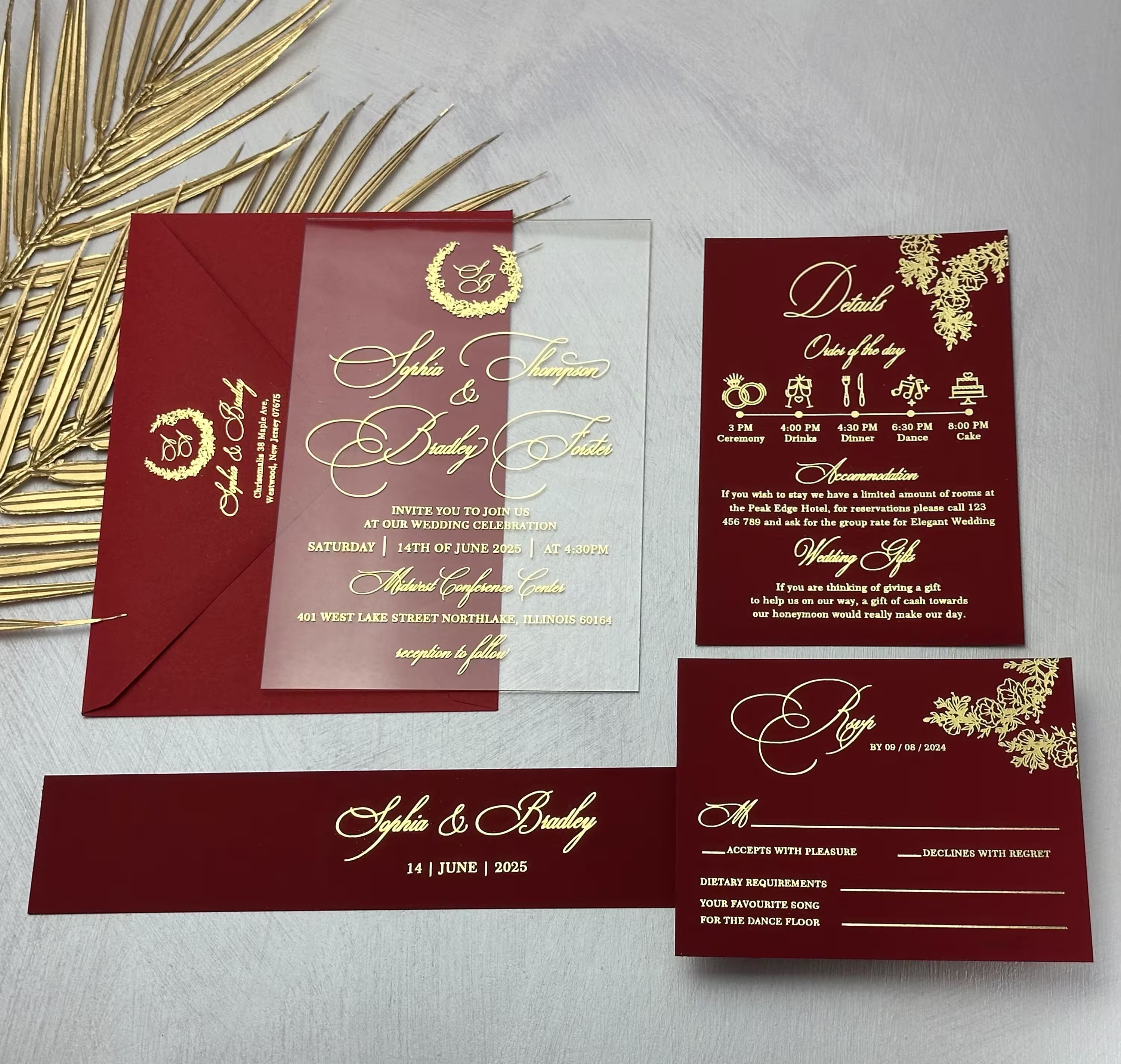 Burgundy acrylic wedding invitation suite with gold foil monogram wreath, calligraphy names and a coordinating details card, RSVP and belly band
