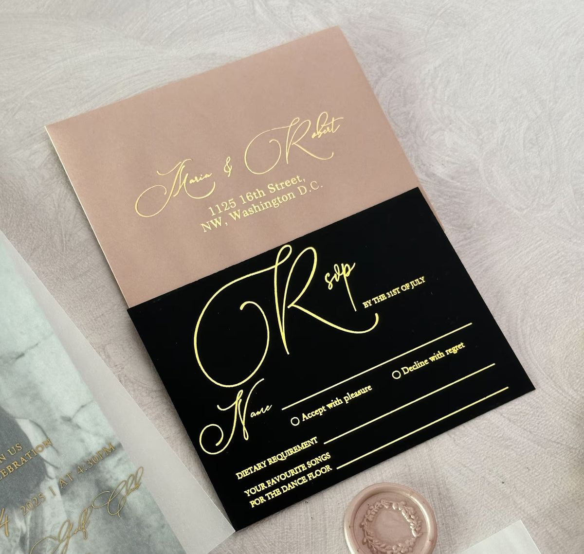 Photo vellum wedding invitation suite flat lay with envelope, RSVP card, and wax seals