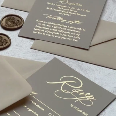 Photo wedding invitation card on vellum with foil names over a couple's picture