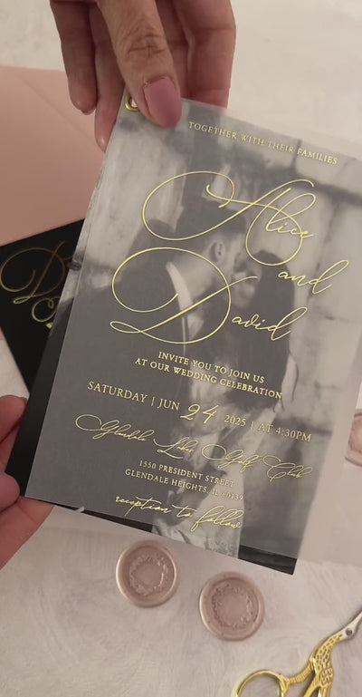 Photo vellum wedding invitation suite with foil names over a black and white couple photo