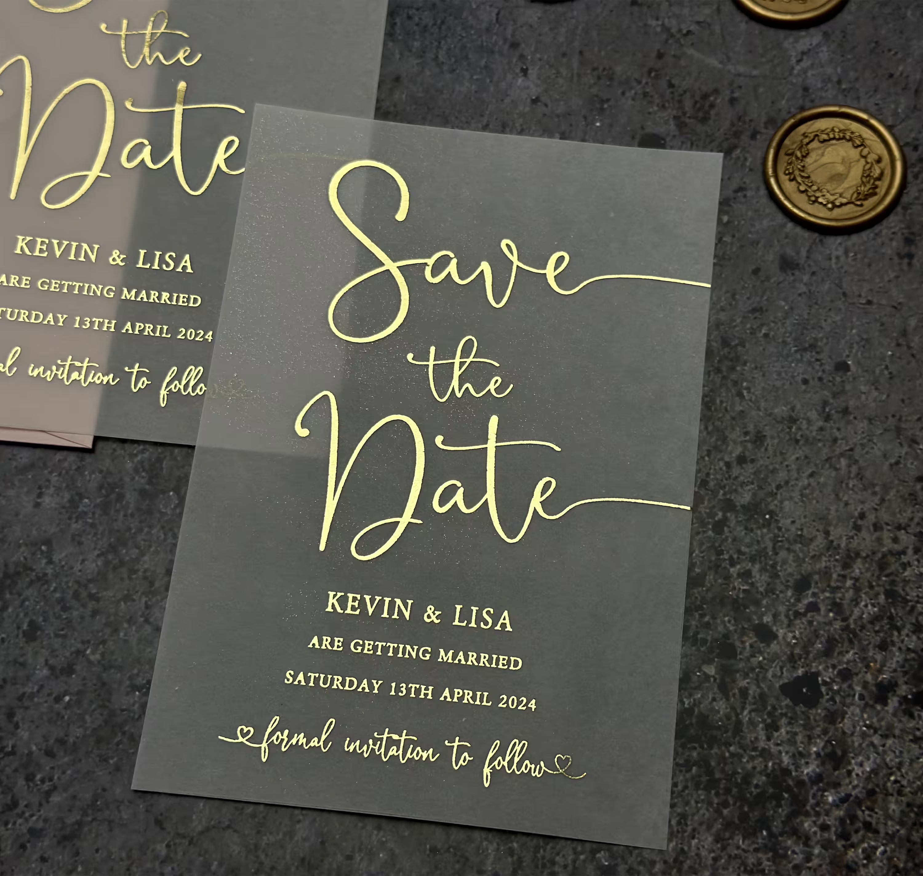Romantic vellum Save the Date with flowing calligraphy and heart details