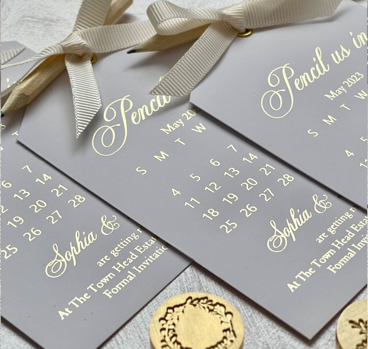 Personalized wedding save the date calendar with a pencil included, foil lettering and the formal invitation to follow.