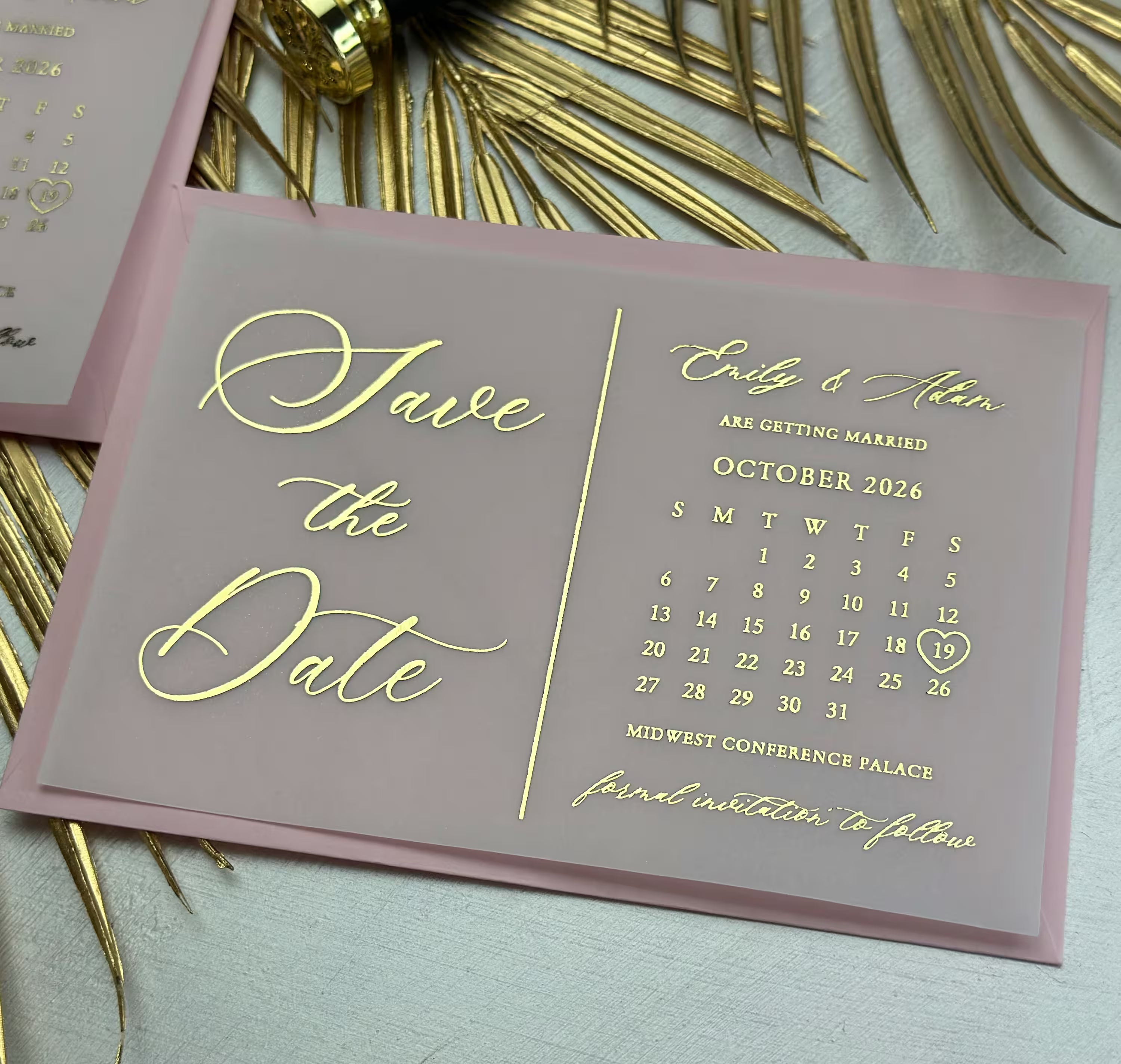 Vellum Save the Date card featuring a calendar and gold foil lettering