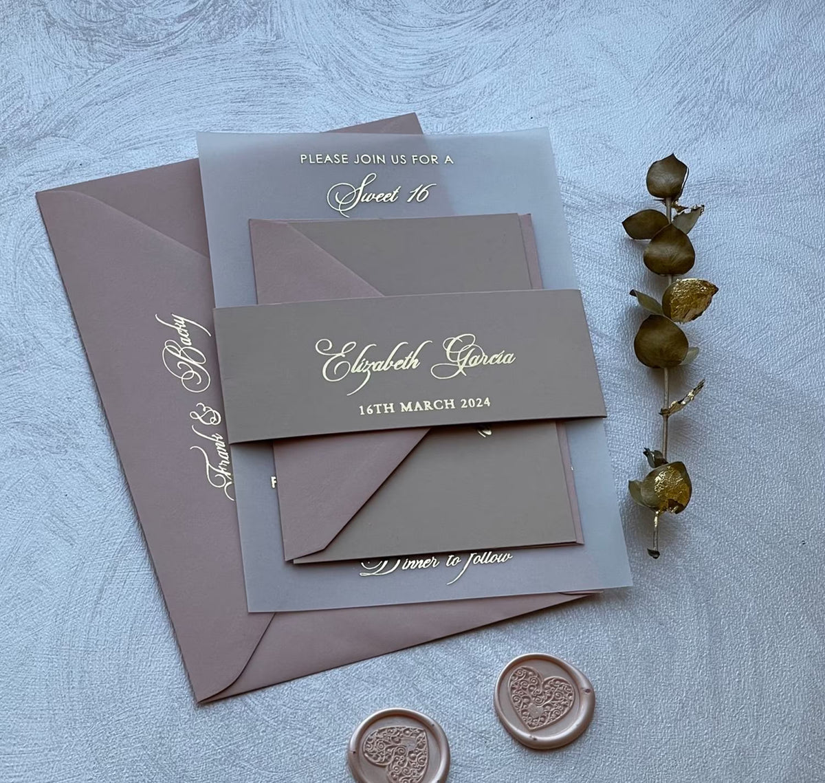 Sweet 16 party invitations on vellum shown with a matching details card for the schedule and information.