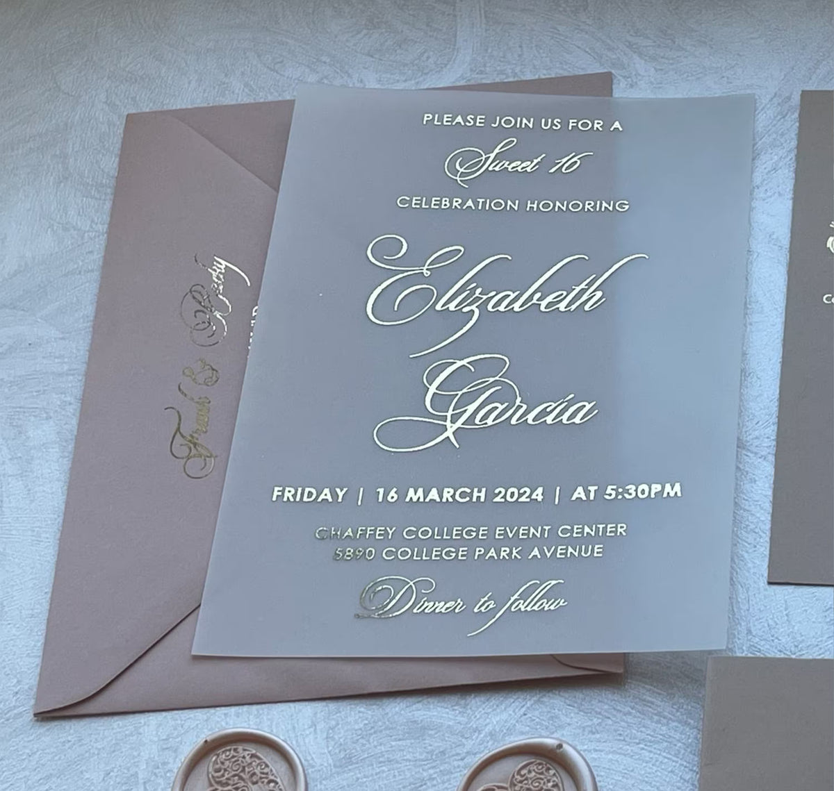 Sweet sixteen invitations set on translucent vellum with foil lettering, personalized with the name, date and venue.